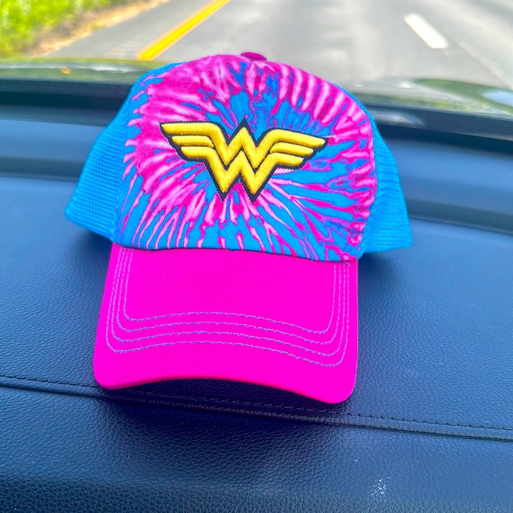 It’s a wonder women hat that’s pink and blue and somewhat tie dye.